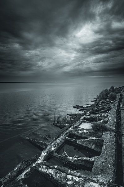 Mine boxes on the edge of the mudflats by peterheinspictures