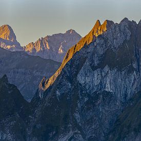 When the sun awakens the peaks by Walter G. Allgöwer