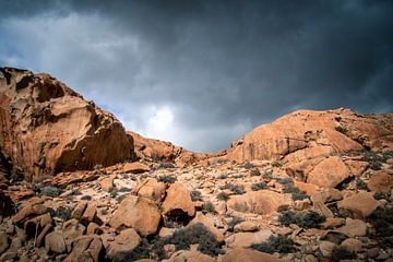 Rock with dark clouds by Dustin Musch