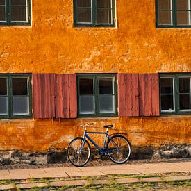 Colorful old wall with bicycle by Robbert Frank Hagens