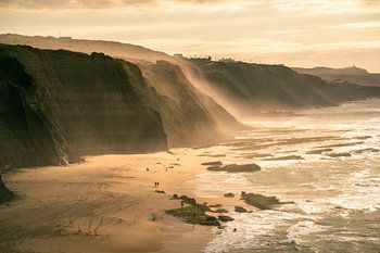 Portugal's coastal cliff with sea air at sunset