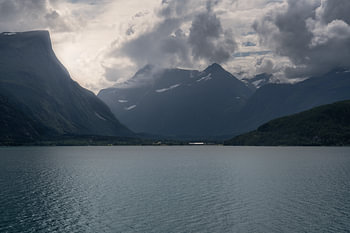 An atmospheric photo print of the Eresfjord, with a view of the Jamtetinden and Nebba