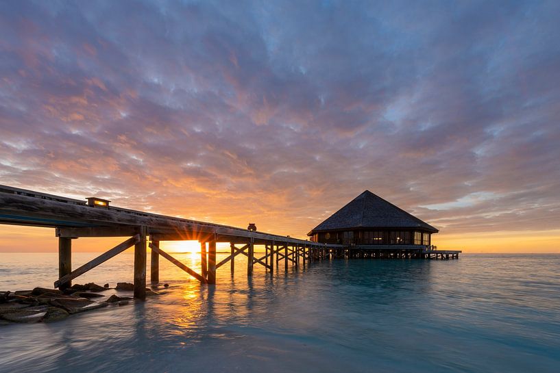Sunset beach house Maldives by Laura Vink