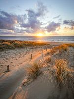 Zon, zee en wolken aan de kust