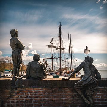 Ship boys in Hoorn looking at the harbour by Jolanda Aalbers