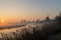 Windmill in Beesd at sunrise and fog by Michelle Peeters thumbnail