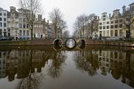 Mistig Amsterdam van Foto Amsterdam/ Peter Bartelings thumbnail
