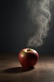 Red apple and rising smoke on the table by Art & Soul Creations