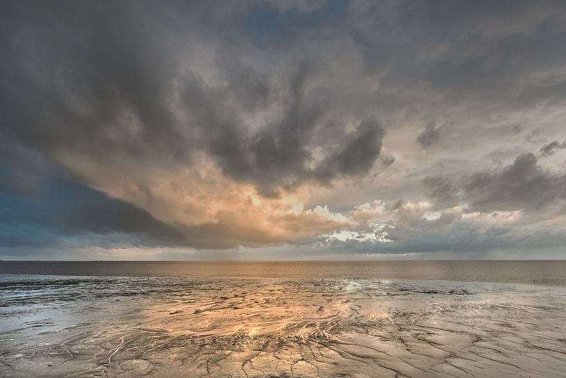 Evening colors above the Wad at low tide near the Frisian city Harlingen by Harrie Muis