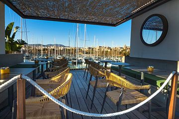 Restaurant at coast marina port of Palma de Majorca city, Spain by Alex Winter