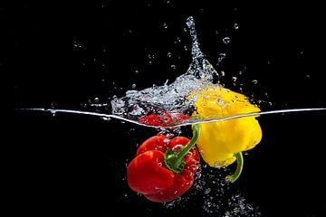 Capsicums in water by Sander van Kampen