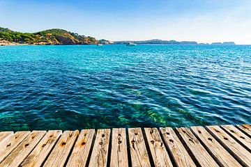 Wooden deck at mediterranean sea background by Alex Winter