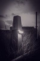 De lichtgevende strandpaal