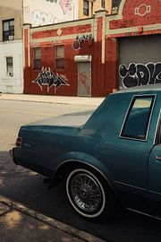 Street style and graffiti: classic car in front of Brooklyn wall by NZME Photography