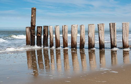 Reflecties aan de zee