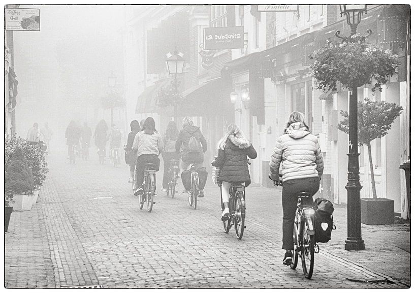 Cyclists in the fog by Michel Groen