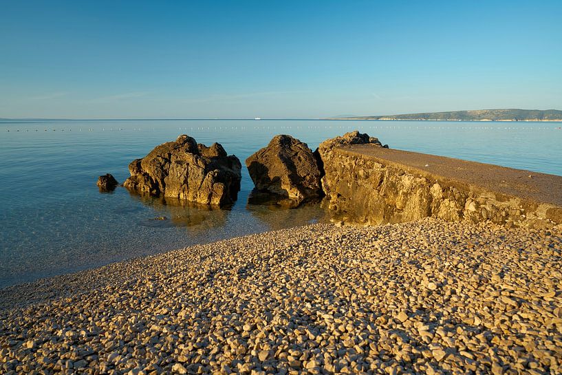 Pebble beach near Krk on the Adriatic Sea in Croatia by Heiko Kueverling