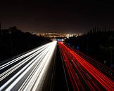 Lichtstreifen auf einer Autobahn von Jordy Blokland Miniaturansicht