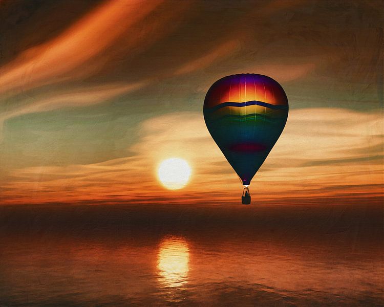 Vol en montgolfière au-dessus de la mer au coucher du soleil sur Jan Keteleer