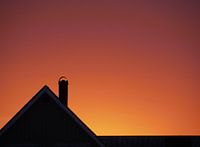 Ochtend silhouet van een vrijstaand huis