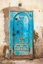 Weathered door in Tan-Tan, Morocco by Ron van der Stappen