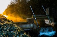 Watersluis bij zonsopkomst