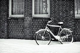 Bicycle in the snow by Streets of Maastricht