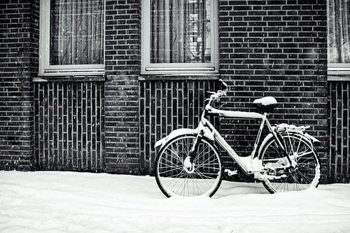 Fiets in de sneeuw