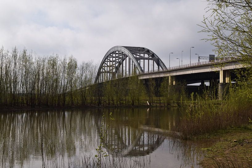 Old arch bridge Lekbrug near Vianen and Nieuwegein over the river Lek with beautiful reflections in  by Robin Verhoef