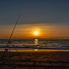 Fishing by Sunset van Marcel Timmer