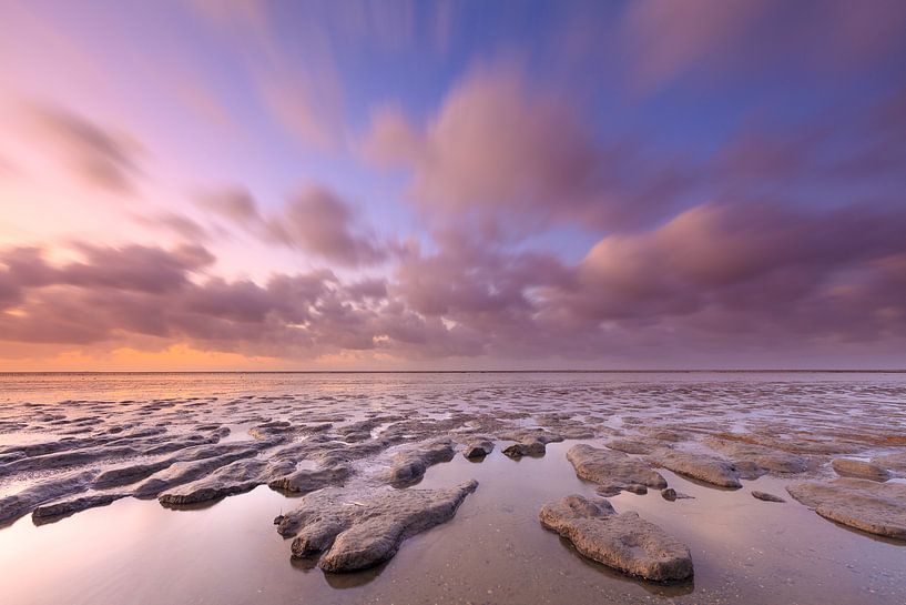 Tidal flats and clouds by Ron Buist