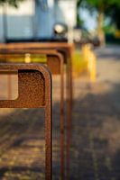 Rusty brown bike racks on the street