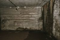 Signpost in an abandoned bunker from 1945.