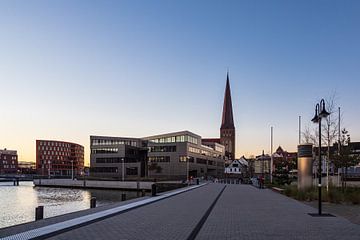 View to a church in Rostock, Germany by Rico Ködder