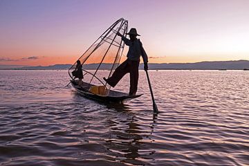 Fisherman on Inle Lake in Myanmar at sunset by Eye on You
