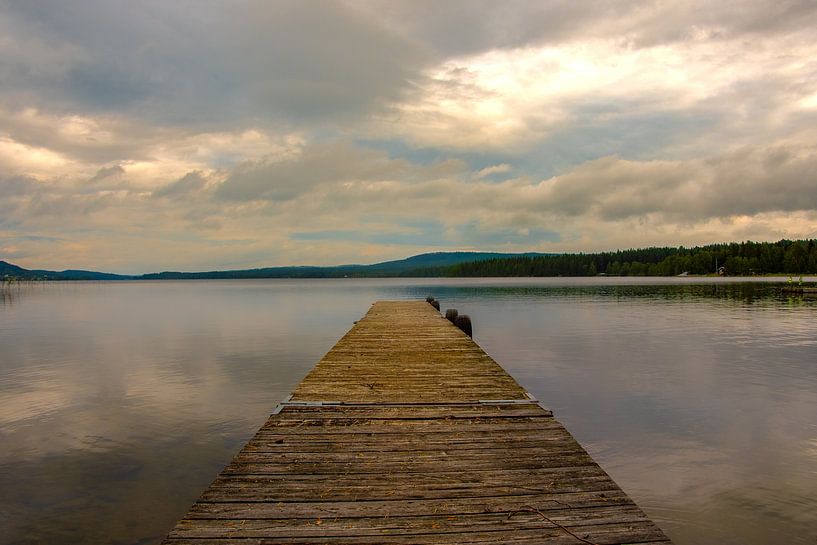 Small dock on a quiet lake by Bas Greevink