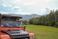 Land Rover in mountain landscape