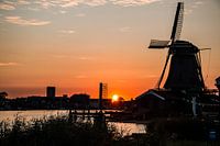Old Dutch Mill on the Zaanse schans with setting sun