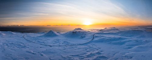 Zonsondergang boven de sneeuwvelden van GoWithRico
