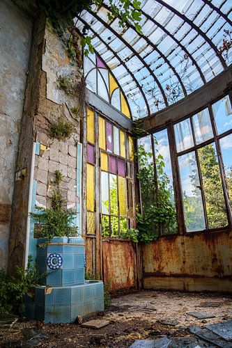 Abandoned greenhouse with stained glass