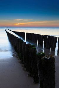 Postes dans la mer sur gaps photography