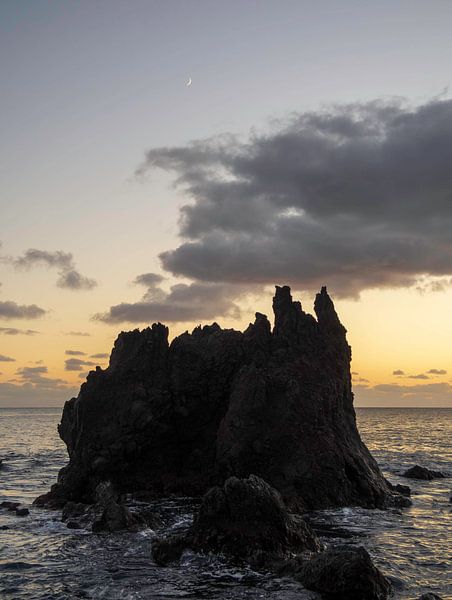 Rock in the surf by Gideon Gerard