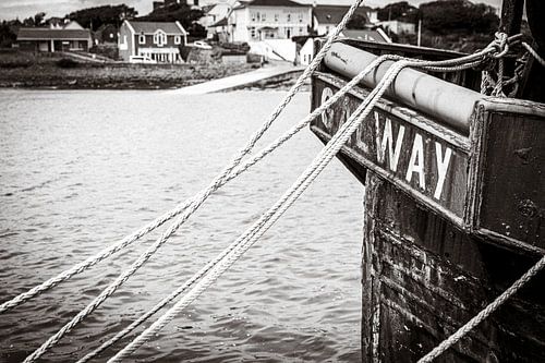 Rusted Galway fishing trawler in an Irish harbour B&W