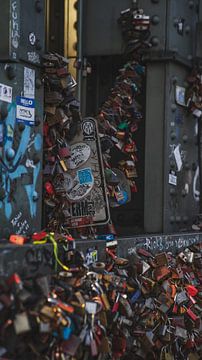 Love locks in abundance by Martijn de Bruin