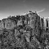 Landschaft bei der Stadt Ronda in Spanien in Andalusien in schwarz-weiß von Manfred Voss, Schwarz-weiss Fotografie