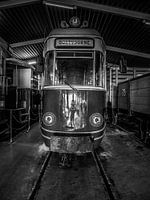 a Nostalgic RTM tram in black and white.