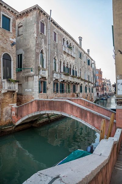 Bridge over canal in old town Venice, Italy by Joost Adriaanse
