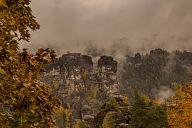 Fog over the Bastei - autumn atmosphere in Saxon Switzerland by Fototante