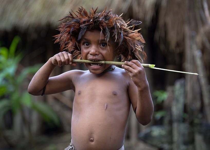 Child of the Dani tribe by Anges van der Logt