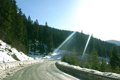 Sunny snowy mountain road in Slovakia